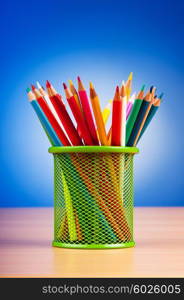 Colourful pencils on the background