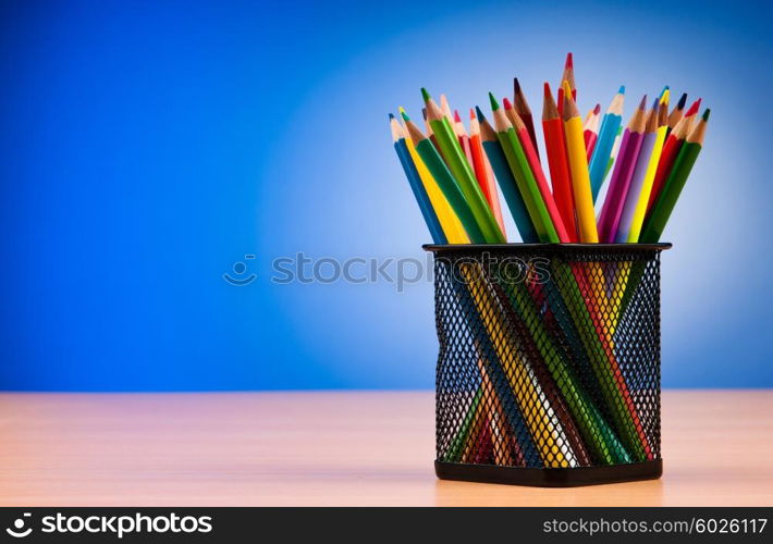 Colourful pencils on the background