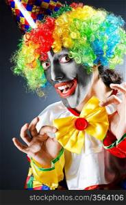 Colourful portrait of birthday clown.