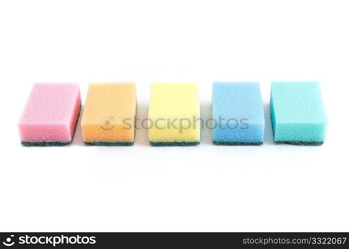 Colourful sponges isolated on a white bg