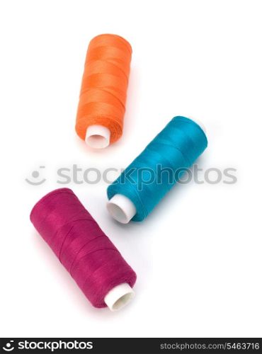 Colourful spools of thread isolated on white background