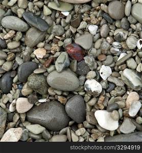 Colourful stones along shoreline in Costa Rica