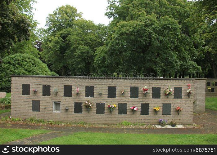 Columbarium at a cemetery, public storage of cinerary urns, memorial wall