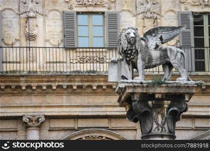Column with the statue of a lion on Piazza delle Erbe. Verona, Italy