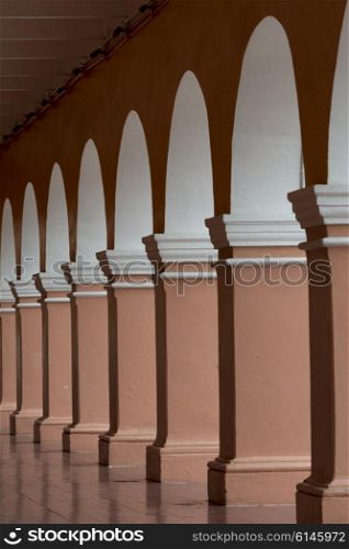Columns and archways along corridor, Centro, Dolores Hidalgo, Guanajuato, Mexico