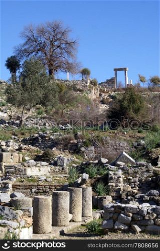 Columns and gate on ruins of Kaunos near Dalyan, Turkey