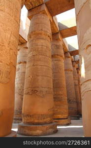 columns in karnak temple with ancient egypt hieroglyphics