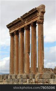Columns of roman temple and cloud in Baalbeck, Lebanon