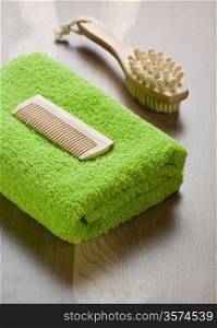 comb and massager with towel