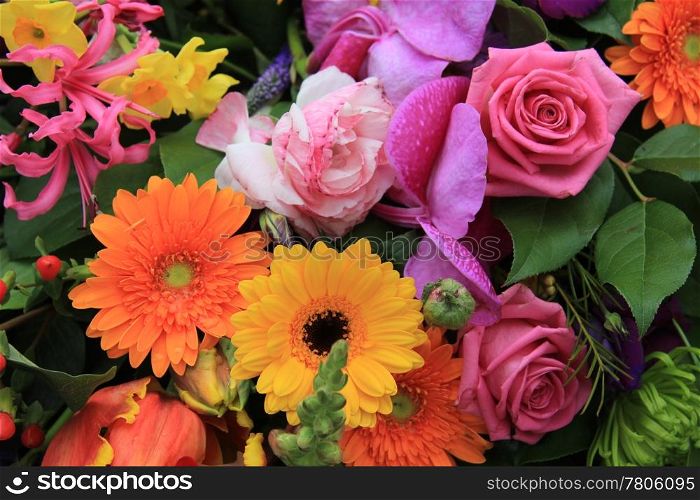 Combination of many different flowers in bright colors in a spring bouquet