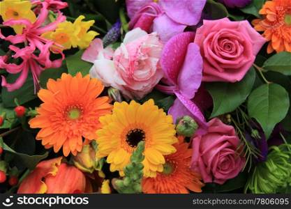 Combination of many different flowers in bright colors in a spring bouquet
