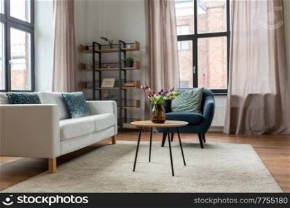 comfort, furniture and interior concept - sofa with cushions at cozy home living room. sofa with cushions at cozy home living room