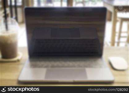Comfortable work desk with notebook laptop, stock photo