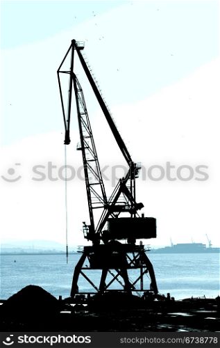 Commercial port cranes. Cranes in a port