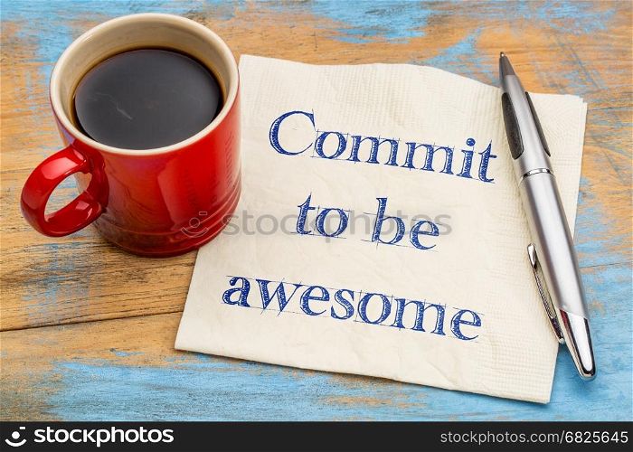 Commit to be awesome - handwriting on a napkin with a cup of coffee