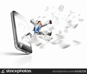 Communication concept. Image of businessman jumping out of mobile phone