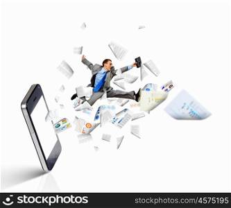 Communication concept. Image of businessman jumping out of mobile phone