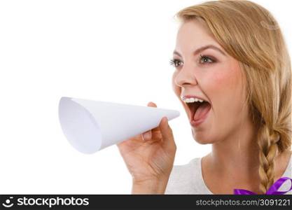 Communication concept. Young blonde woman talking loud through megaphone made of paper.. Woman screaming through megaphone made of paper