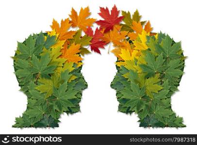 Communication exchange business partnership and teamwork symbol as two human heads made of tree leaves connected together as a symbol of network relationships. and nature cooperation.