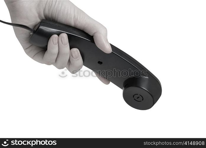Communication on white. office black telephone with hand dialing.
