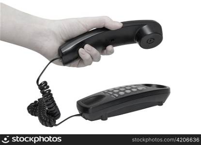 Communication on white. office black telephone with hands dialing.