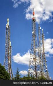 communication towers, antennas, transmitters and repeaters for mobile communications