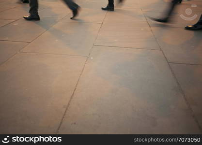 Commuters legs at sunset