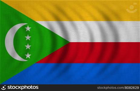 Comorian national official flag. African patriotic symbol, banner, element, background. Correct colors. Flag of Comoros wavy with real detailed fabric texture, accurate size, illustration