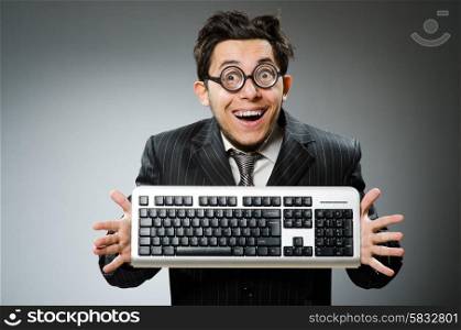Comouter geek with computer keyboard