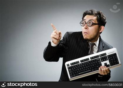 Comouter geek with computer keyboard