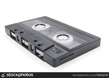Compact audio cassette tape on a white background