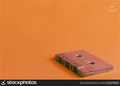 compact cassette orange background