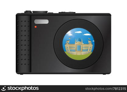 Compact digital camera with snapshot of Berlin&rsquo;s Parliament building on the lens.