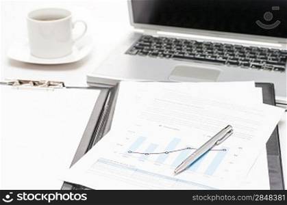 Company growth column chart business meeting office desk laptop