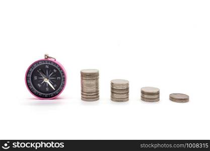 compass and coins on white background