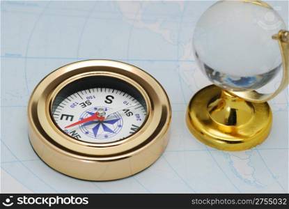 Compass and glass globe. The device for the instruction of a direction and a card