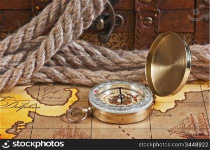 compass and rope on a map