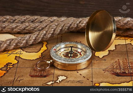 compass and rope on a map