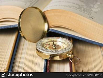 compass and the old books