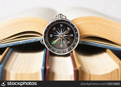 compass and the old books