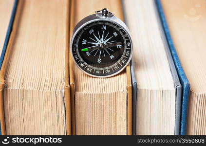 compass and the old books