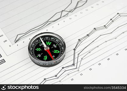 compass and working paper with diagram
