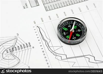 compass and working paper with diagram