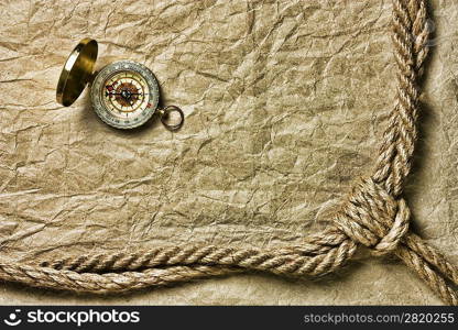 compass, old paper and rope, still-life