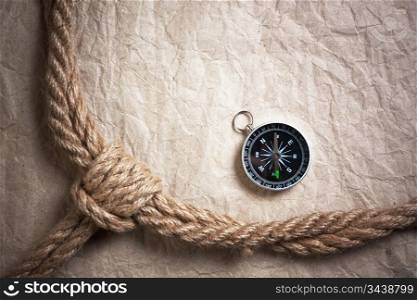 compass ,old paper and rope, still-life
