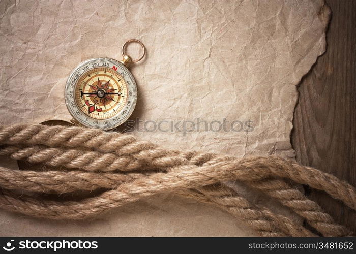 compass, old paper and rope, still-life