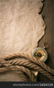 compass, old paper and rope, still-life