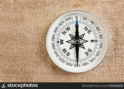 compass on old canvas background