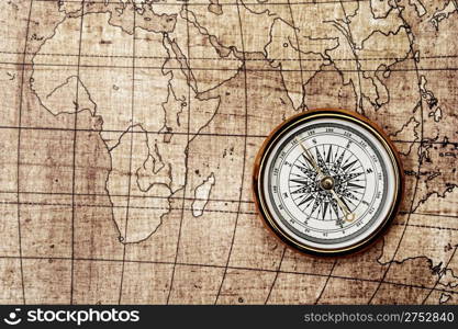 Compass on old map. Brown tone color