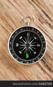 compass on old wooden background